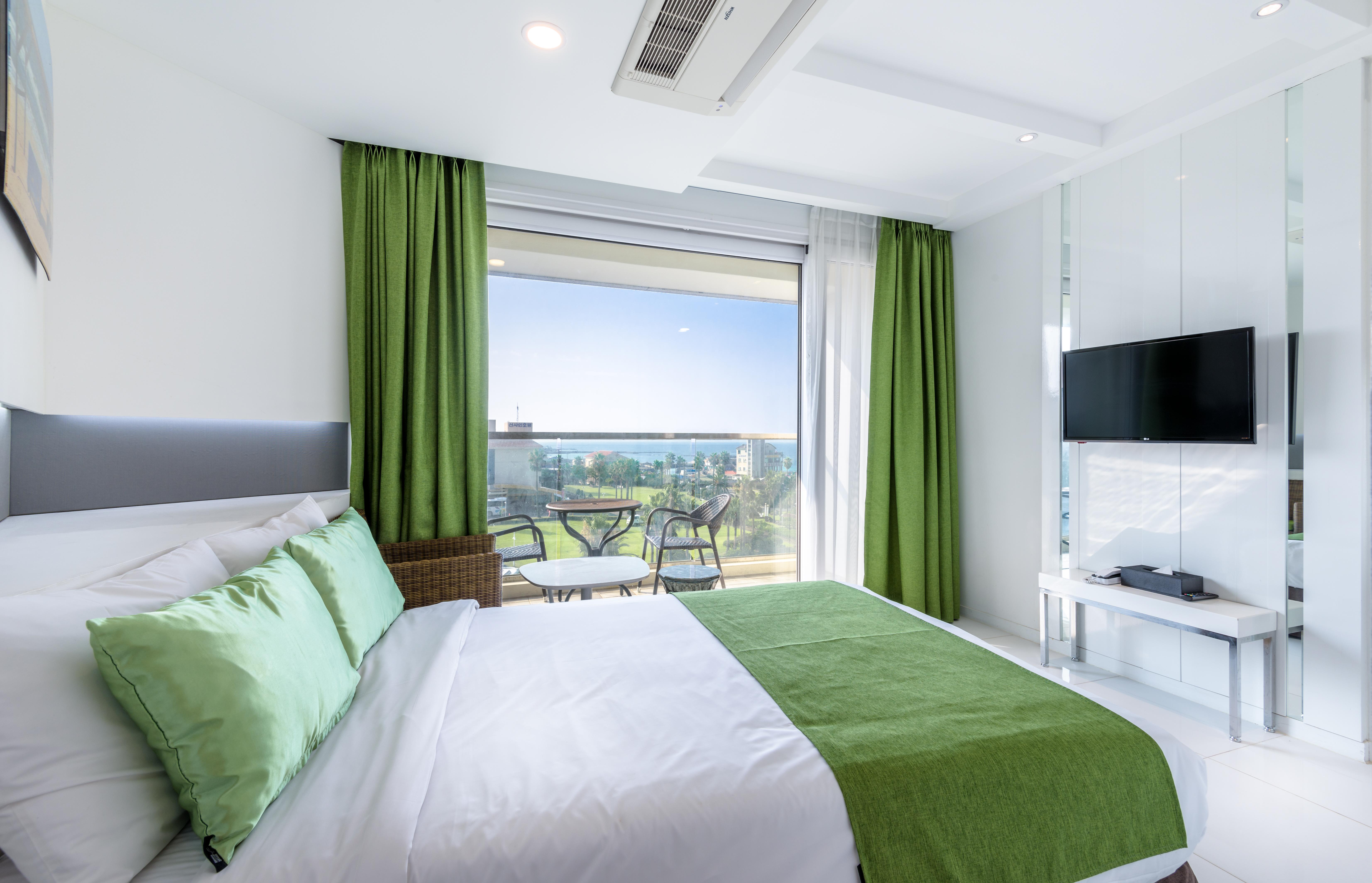 Aimi Jeju Beach Hotel Екстер'єр фото