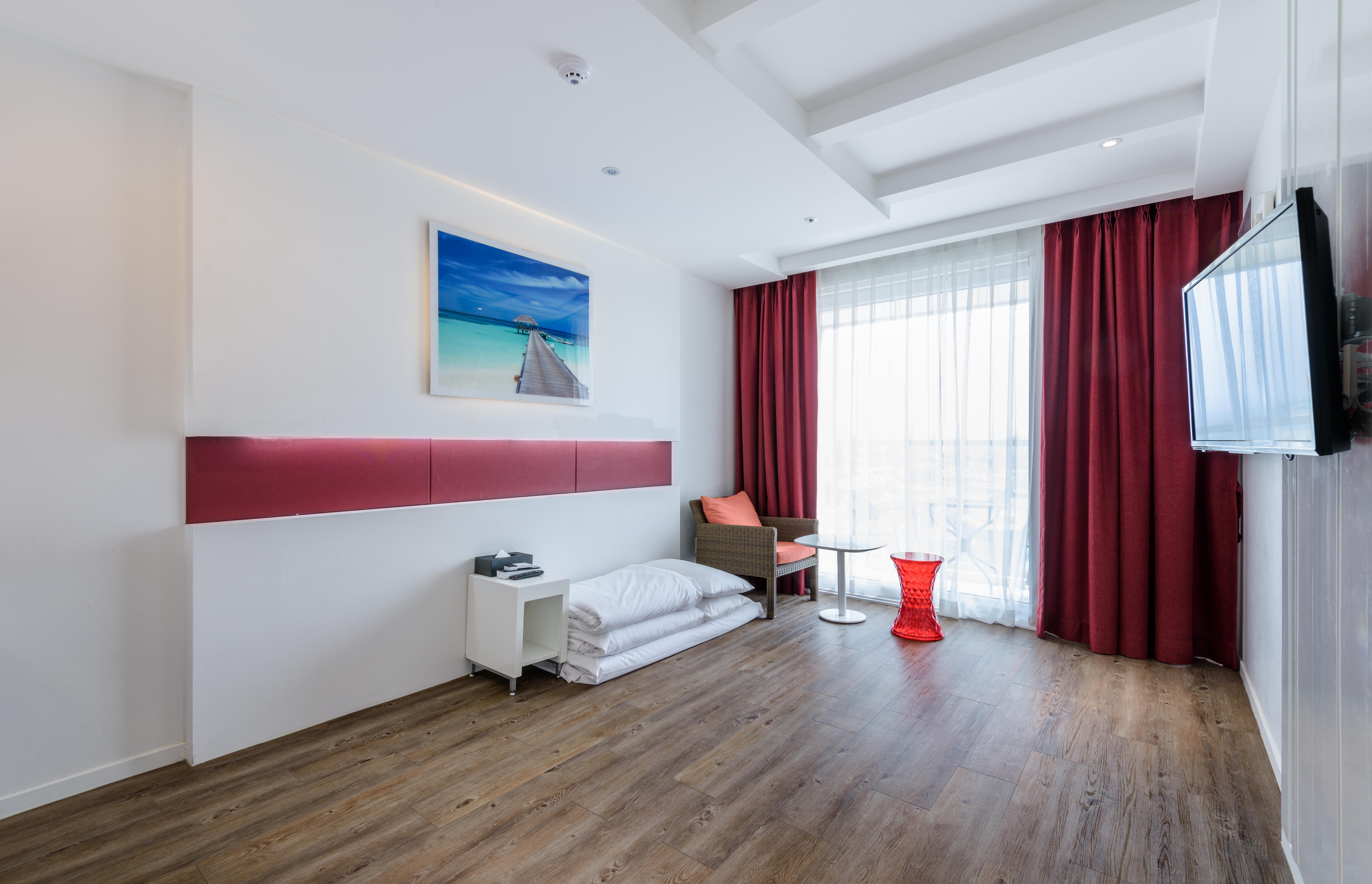 Aimi Jeju Beach Hotel Екстер'єр фото