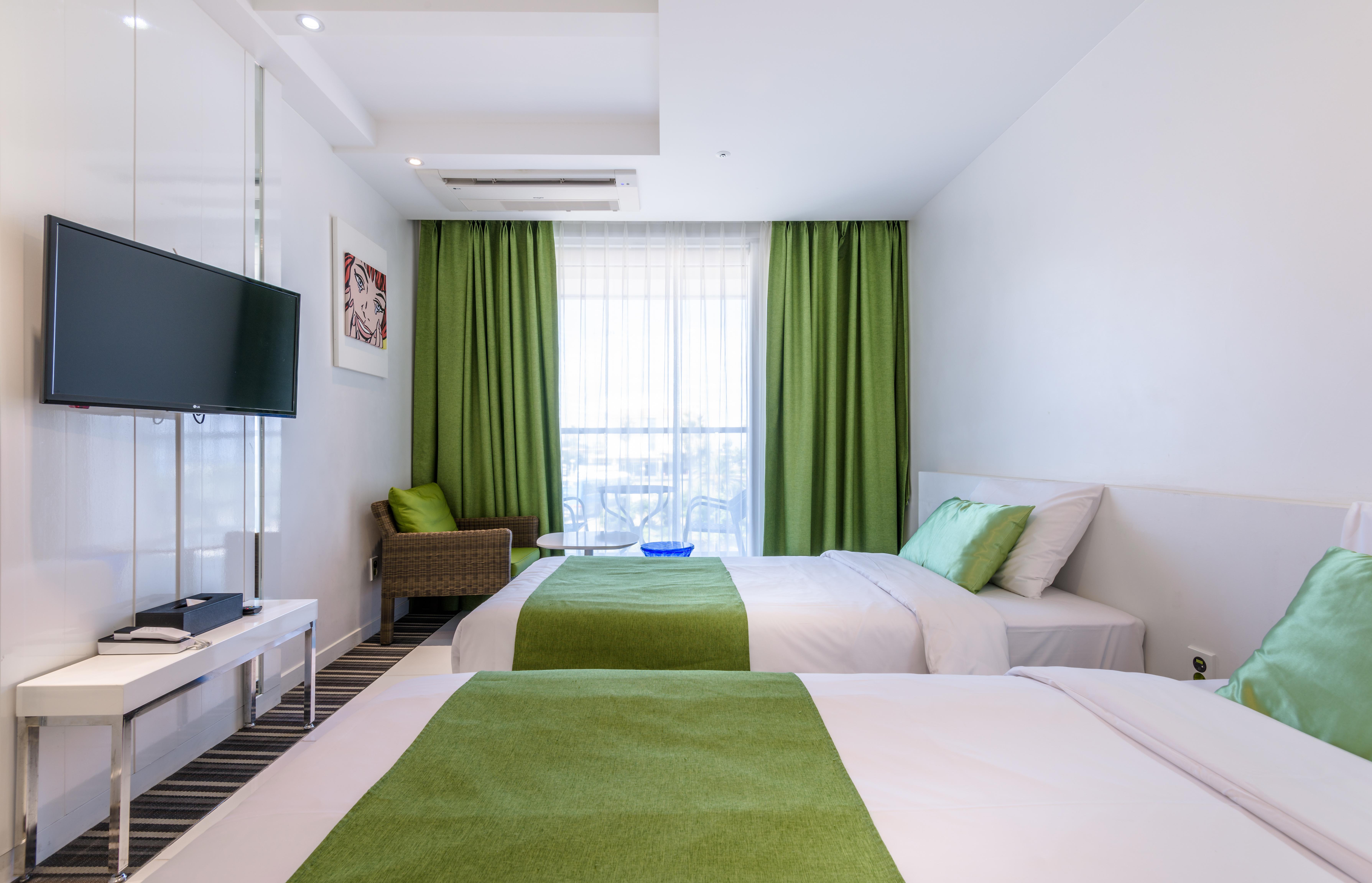 Aimi Jeju Beach Hotel Екстер'єр фото