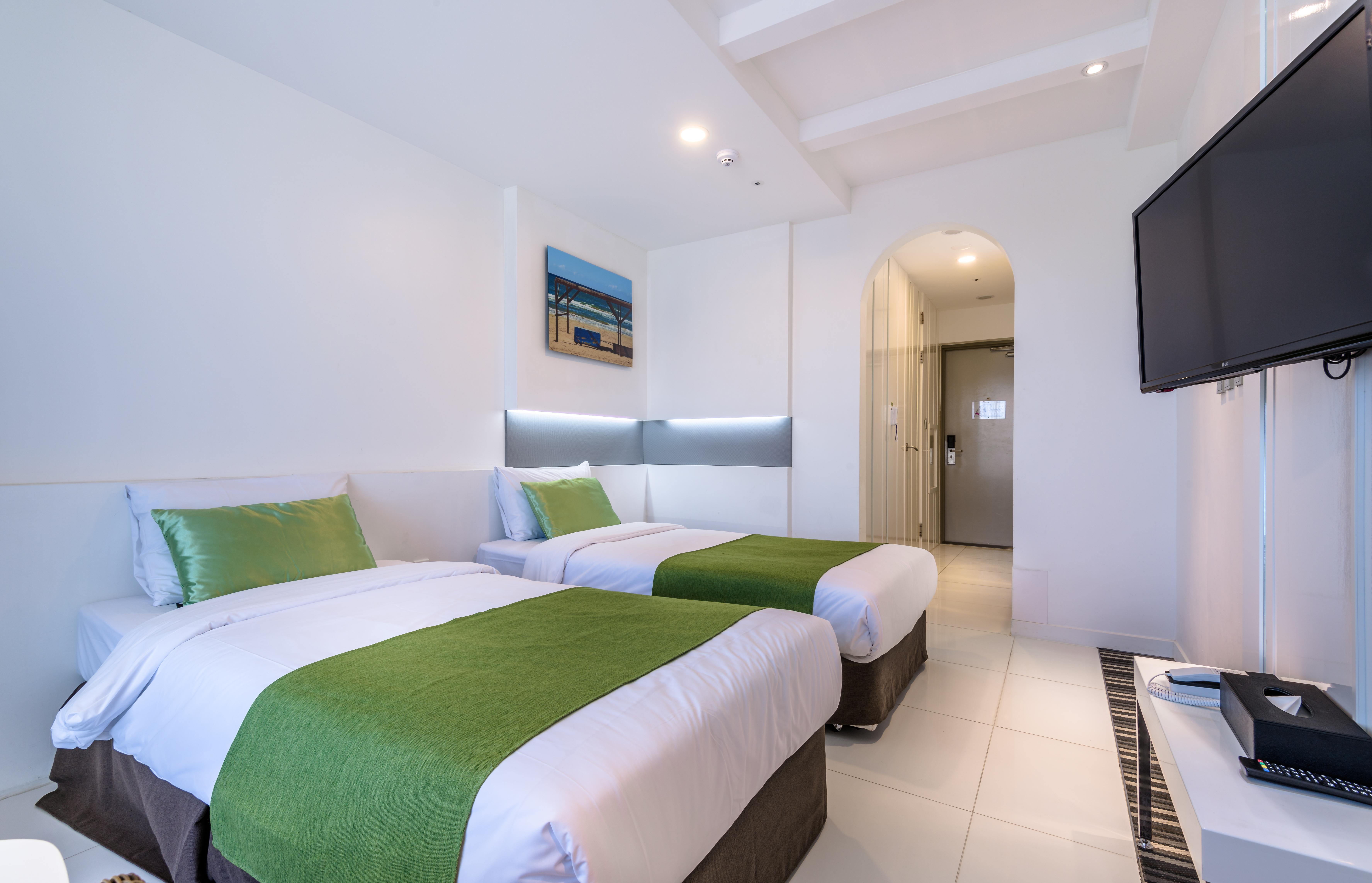 Aimi Jeju Beach Hotel Екстер'єр фото